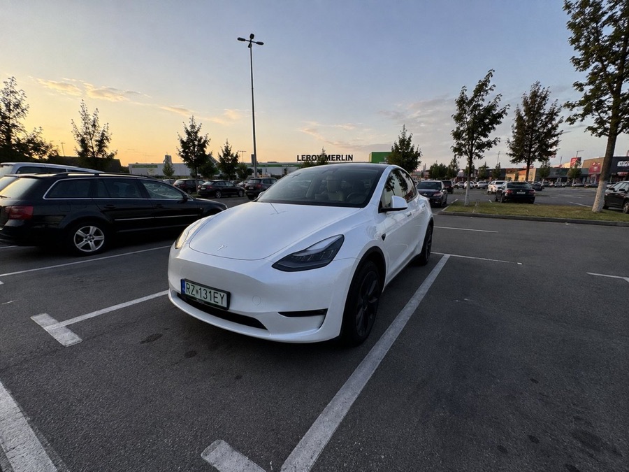 Realistic iPhone Photo: Tesla Model Y at 0.5x — image generated with a GPT Image 2.5 prompt